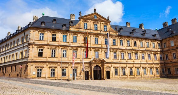 New Residence building at Domplatz square in Bamberg old town. Bamberg is a city on the river Regnitz in Upper Franconia, Bavaria in Germany.