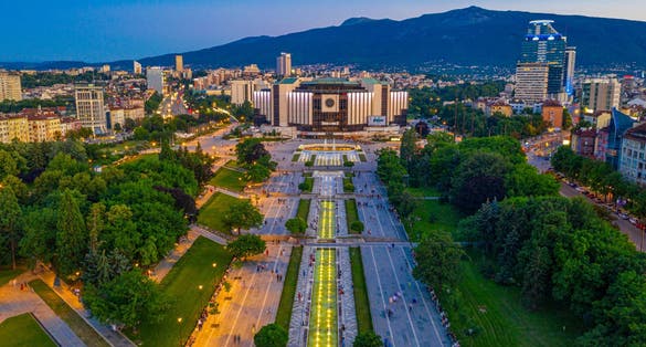 Photo of sunset aerial view of the National Palace of Culture in Sofia, Bulgaria.