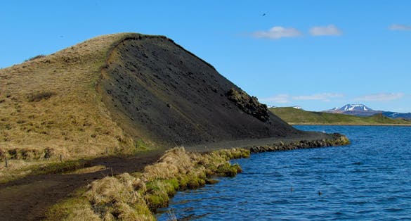 photo of view of Surreal landscape of the Lake Myvatn pseudocraters in Skútustaðir, Iceland.