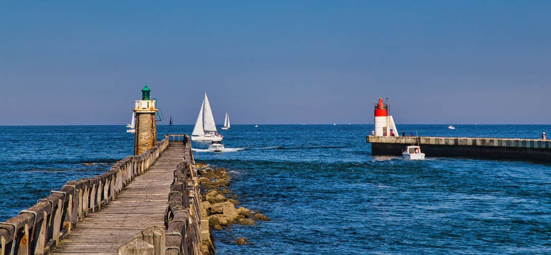 Capbreton village on the coast of the French Basque Country, wooden walkway by the sea, France