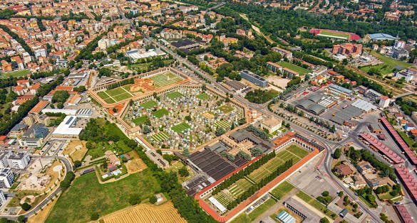 Parma, Italy. Cemetery Della Villetta. Panorama of the city on a summer day. Sunny weather with clouds. Aerial view
