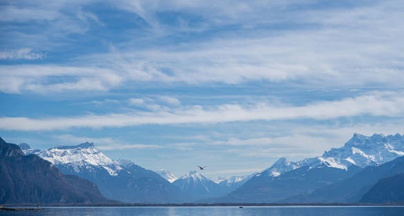 Photo of mountain and water background view, Lake Geneva Vevey, Switzerland.