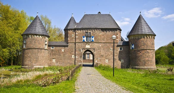 Photo of castle Vondern in Oberhausen on a sunny day, Germany.