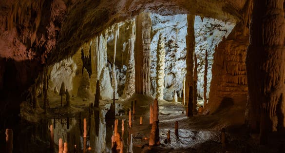 The Frasassi Caves (Italian: Grotte di Frasassi) are a karst cave system in the municipality of Genga, Italy, in the province of Ancona, Marche. They are among the most famous show caves in Italy.