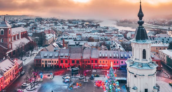 Drone aerial view of Kaunas town hall square with Christmas Tree in winter morning