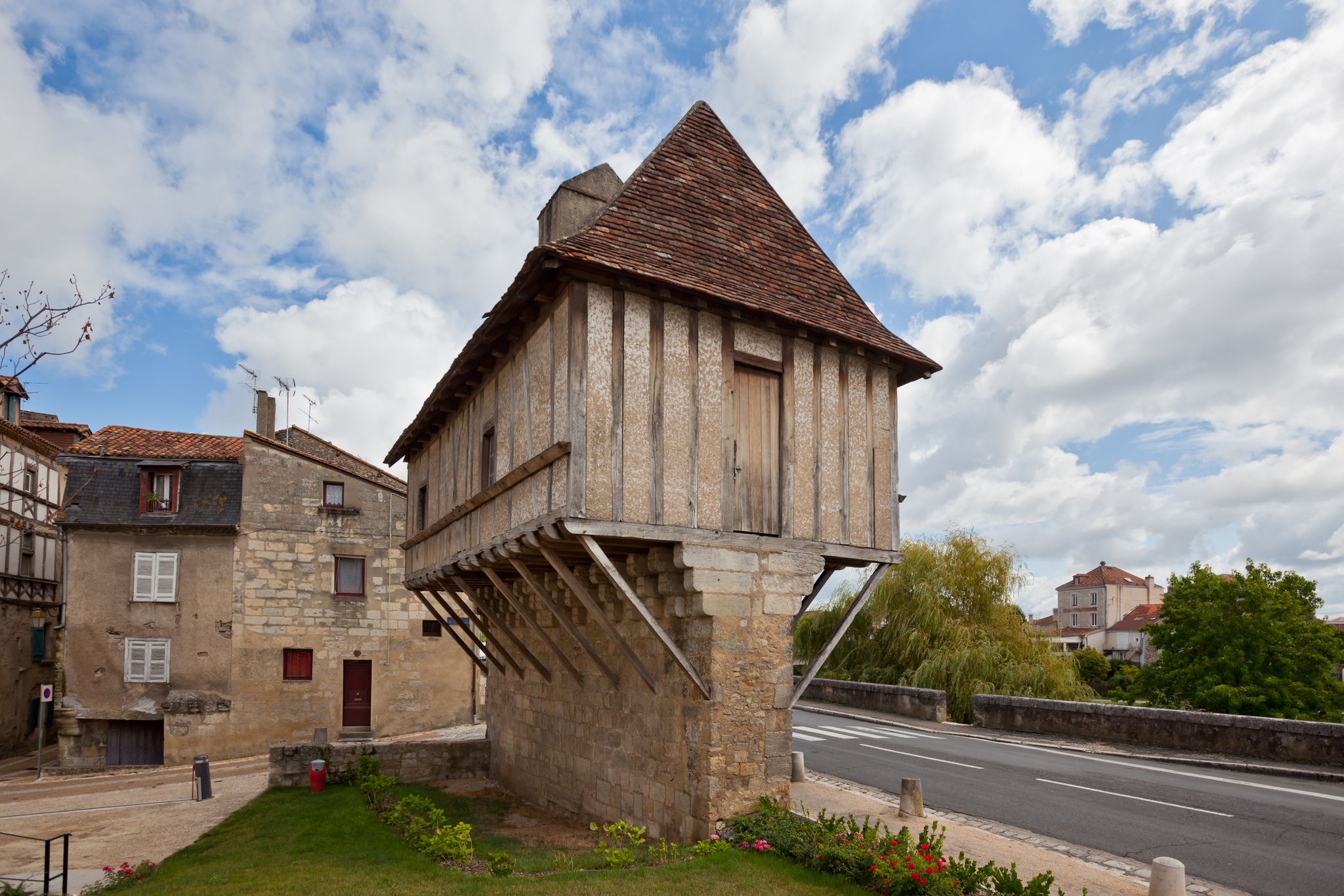 Photo of Picturesque view of Perigueux town in France. Traditional house with half-timbered walls.