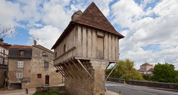 Photo of Picturesque view of Perigueux town in France. Traditional house with half-timbered walls.