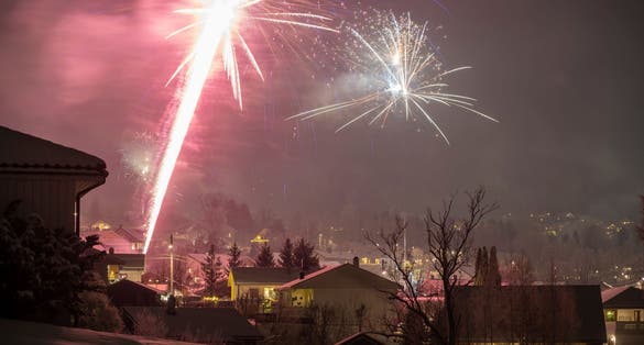 Exuberant Explosions Paint the Sky, Marking a Joyous Scandinavian Celebration Over Drammen, Norway.