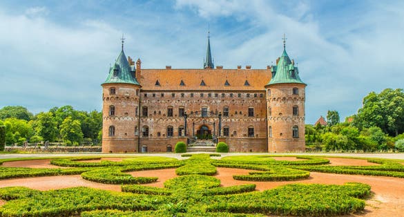 Photo of Egeskov Castle ,Danish: Egeskov Slot, is located near Kværndrup, in the south of the island of Funen (Fyn), Denmark. The castle is Europe's best preserved Renaissance water castle.
