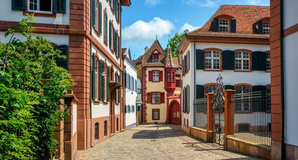 Photo of street and colorful houses in the historical Old Town in Basel city center, Switzerland.
