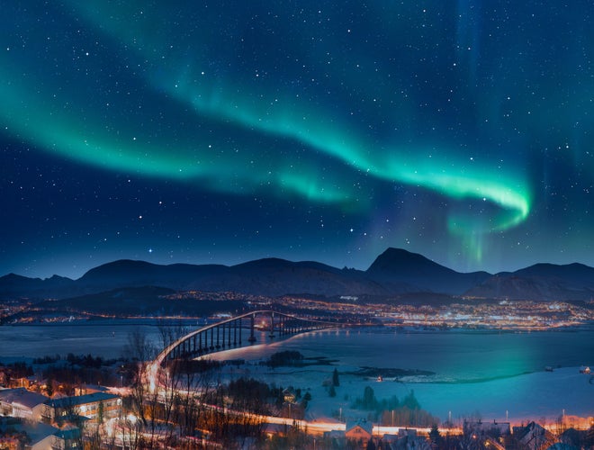 Aurora borealis or Northern lights in the sky over Tromso with Sandnessundet Bridge - Tromso, Norway.jpg