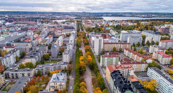 Photo of aerial autumn view of the Tampere city in autumn with colorful leaves, Finland.