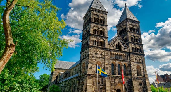 photo of The Lund Cathedral in Lund, Sweden on sunny day exterior view.