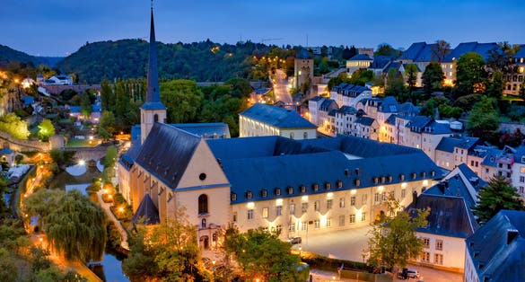 Photo of skyline of Luxembourg city viewed over the grund quarter, Neumünster abbey.