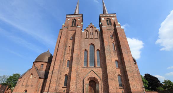 Photo of the entrance of Roskilde Cathedral, church of the Danish royal family in Denmark.