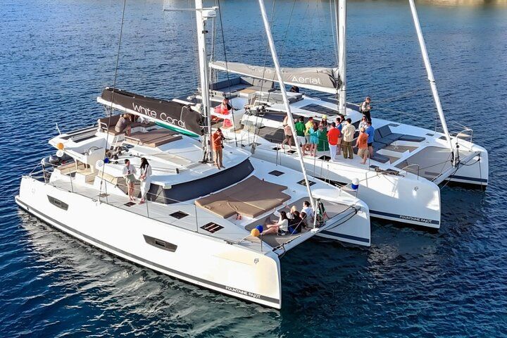 Mykonos: Brand-New Catamaran Cruise with Meal, Drinks & Transport