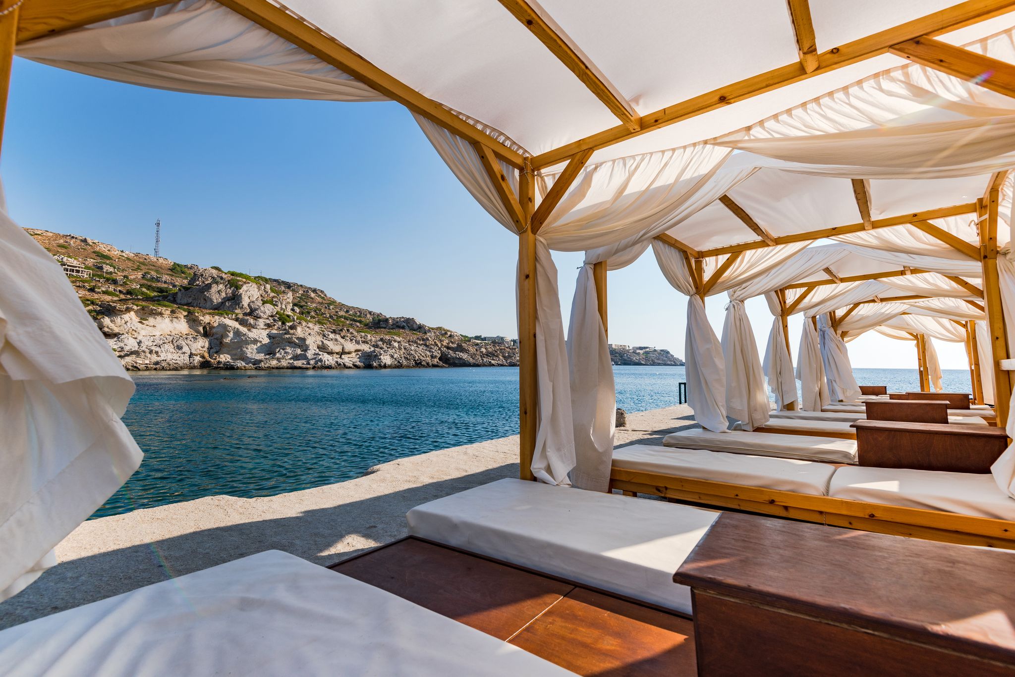 Photo of luxury and relaxing place at Kalithea Spring Beach, Rhodes, Greece. 