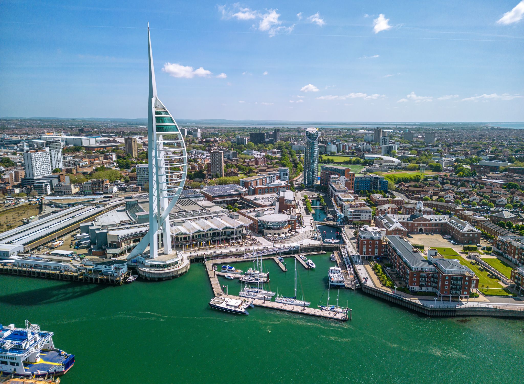 Photo of aerial view of Spinnaker Tower and Portsmouth Harbour, England.