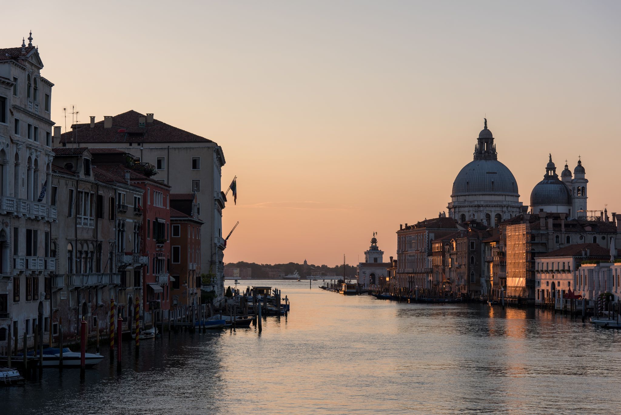 photo of A wide angle shot of the Gallerie dell'Accademia Museum next to the water in Venice, Italy.
