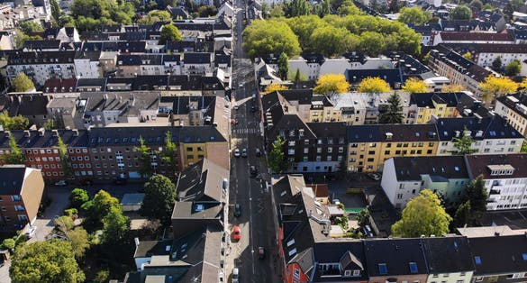 Photo of aerial view of streets and residential architecture of Oberhausen city in Germany. 