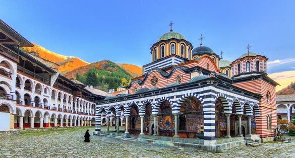Photo of Beautiful view of the Orthodox Rila Monastery, a famous tourist attraction and cultural heritage monument in the Rila Nature Park mountains in Bulgaria.