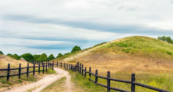 photo of road in Old Uppsala archaeological area in Gamla Uppsala, Sweden.