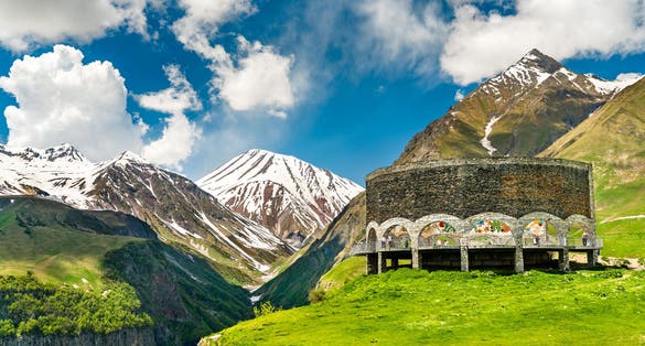 Photo of friendship Monument on the Georgian military road at the Jvari pass, Georgia.