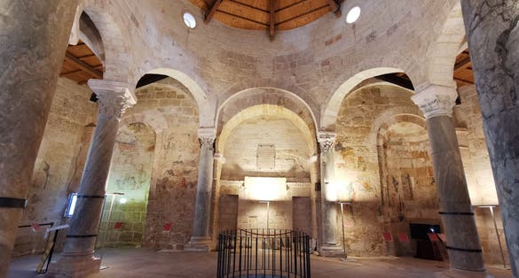 A view of the eleventh century Church of San Giovanni al Sepolcro in Brindisi in the Puglia region of Italy from the public access garden on its back side