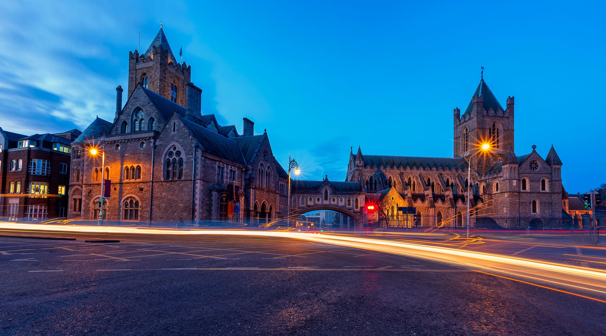 Photo of Arch of the Christ Church Cathedral in Dublin, Ireland at night.