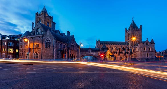 Photo of Arch of the Christ Church Cathedral in Dublin, Ireland at night.