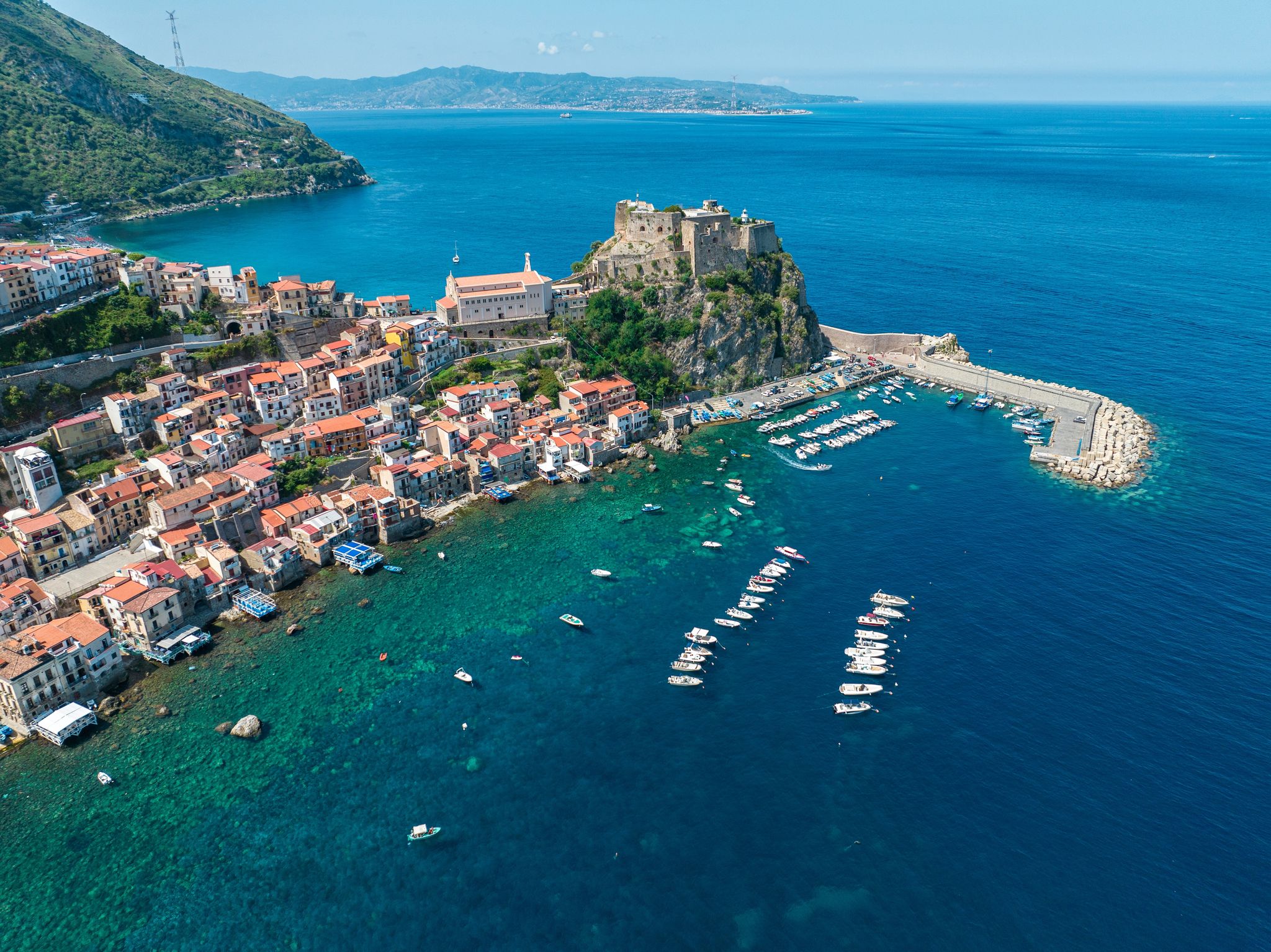 photo of view of Aerial view of Scilla, Reggio Calabria, Calabria. Promontory at the northern entrance of the Strait of Messina. Ruffo Castle and lighthouse. Tyrrhenian Sea. Italy
