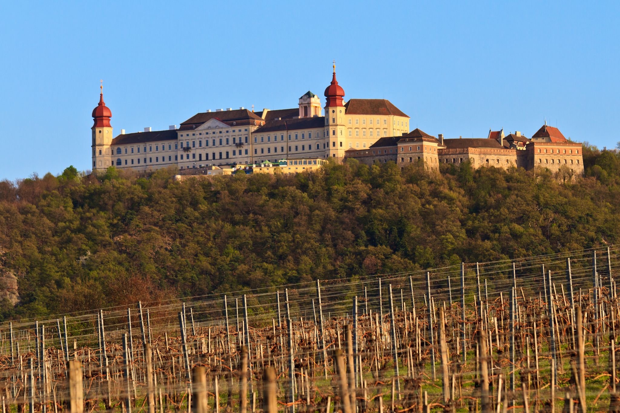 Photo of Wachau Abbey of Goettweig with surrounding vineyard, Lower Austria.