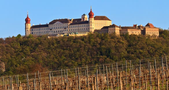 Photo of Wachau Abbey of Goettweig with surrounding vineyard, Lower Austria.