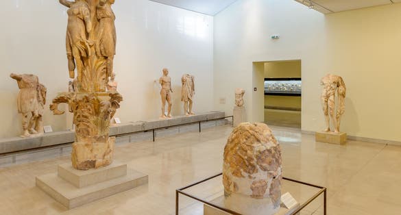 Photo of Statues at the Archaeological museum in Epidaurus, Greece. Delphi is a famous archaeogical site in Greece.