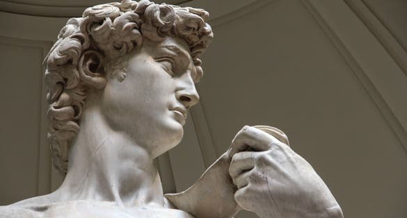 photo of Close Up of Statue of David of Michelangelo in Accademia Gallery of Florence, Galleria dell'Accademia, Italy.
