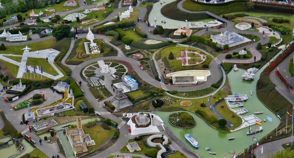 BRUSSELS, BELGIUM - Panoramic view from the observation deck on the top level of the Atomium - the green trees, modern and historic buildings, and miniature Park "Mini Europe",