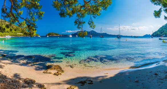 Photo of beautiful beach Playa de Formentor, Palma Mallorca, Spain.