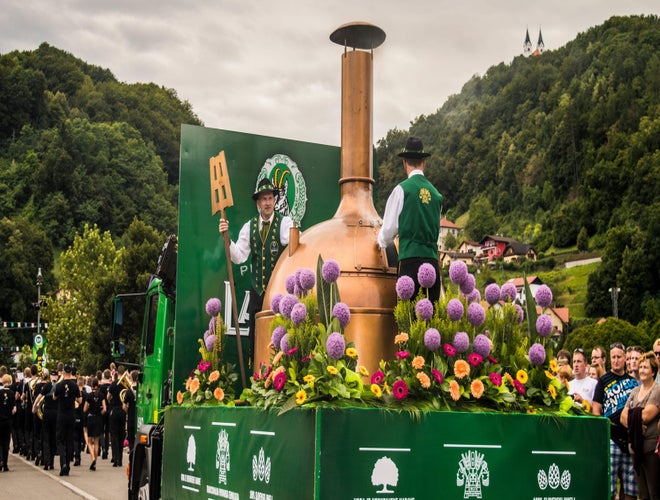 Parade float with a brewing kettle and flowers at the Beer and Flowers Festival in Lasko, Slovenia..jpg