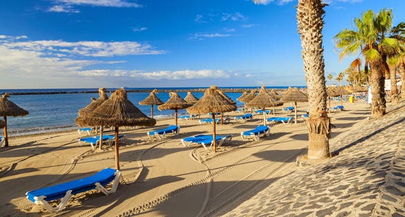 Photo of Los Cristianos beautiful beach in the island of Tenerife, Canary Islands, Spain.