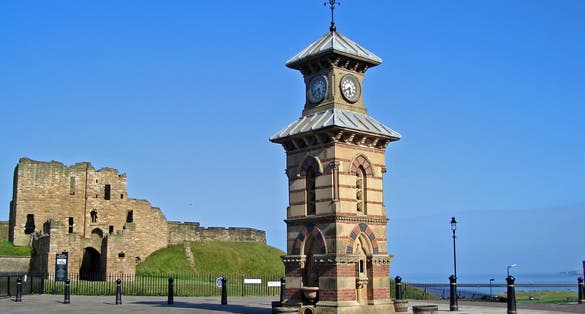 Photo of clock tower and Priory ruins in Tynemouth Newcastle England.