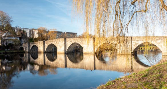 The Saint-Etienne bridge is a bridge of the city of Limoges. It is 120 m long and was built in the 13th century. Photographed in the fall. Limoges is a french