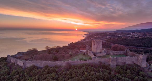 photo of view of The castle of Platamonas, medieval fortress of south macedonia, aerial view during sunrise,Neos Panteleimonas Greece.