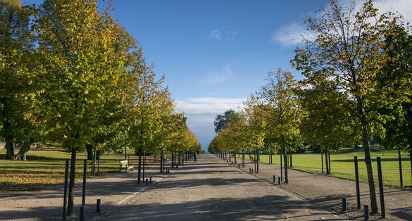 Photo of Kaivopuisto city urban park in Helsinki Finland on sunny day.