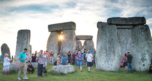 During the annual summer solstice celebration at Stonehenge, visitors can get as close to the circle of stones as they like. The celebration lasts all night.