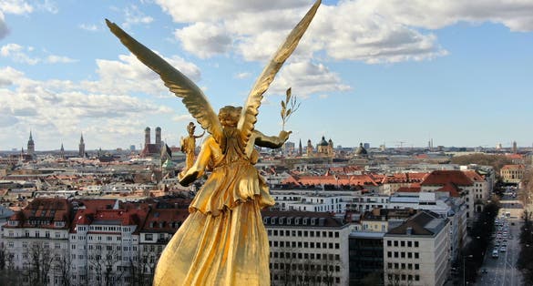 photo of view of Drone view of the Friedensengel, a monument on the Isarhochufer in Munich Bogenhausen at a height of about 34m, Munich, Germany.
