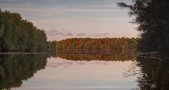 photo of view of A walk at te recreation area Sechs-Seen-Platte in Duisburg Wedau on a sunny and cold winter day, Duisburg,, Germany.