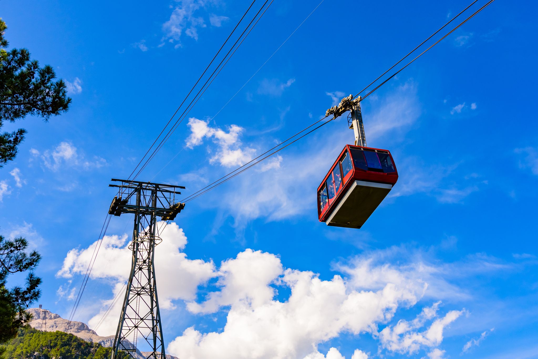 photo of cable car of Olympos Aerial Tram on Tahtali mountain not far from Kemer town. Antalya province, Turkey.