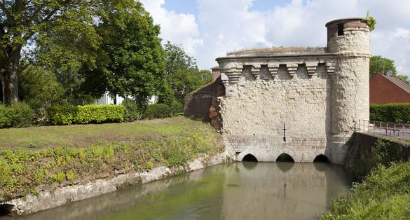 Cambrai, France. The water gate that allowed the river Escaut to flow through the walls and thus into the town. Built at the end of the 14th Century.