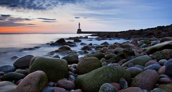 Photo of lighthouse in Aberdeen at beautiful sunset.