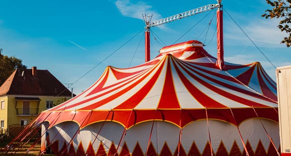 Photo of Autumn or indian summer view with a red and white circus tent near Wallerfing, Deggendorf, Bavaria, Germany